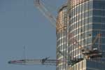 Burj Dubai enters final leg of construction with dismantling of high-altitude cranes.