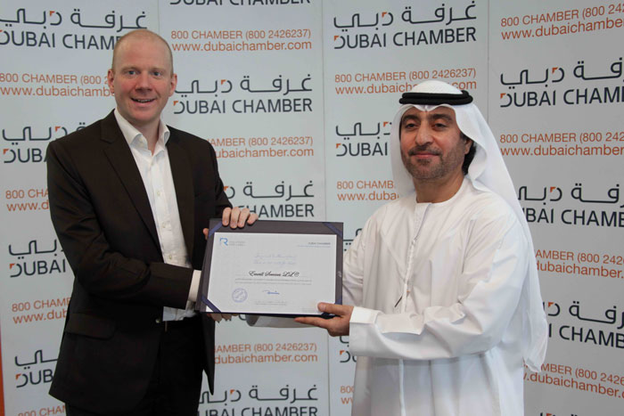 Ben Churchill, Managing Director - Emrill receiving the Dubai Chamber CSR Label from H.E. Hisham Al Shirawi, 2nd Vice Chairman, Dubai Chamber.