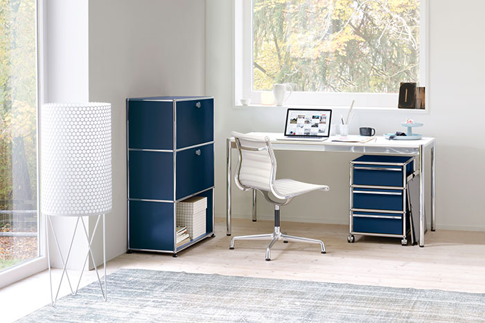 CHAPLINS Haller Storage System And Desk By USM And Eames Aluminium Chair EA 105 By Vitra.