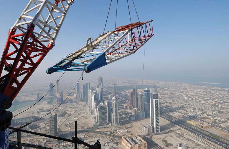 Burj Dubai enters final leg of construction with dismantling of high-altitude cranes.