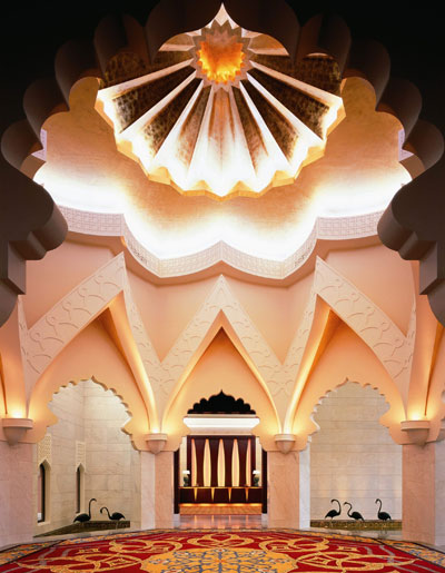 Photo showing architectural lighting in action in a hotel lobby.