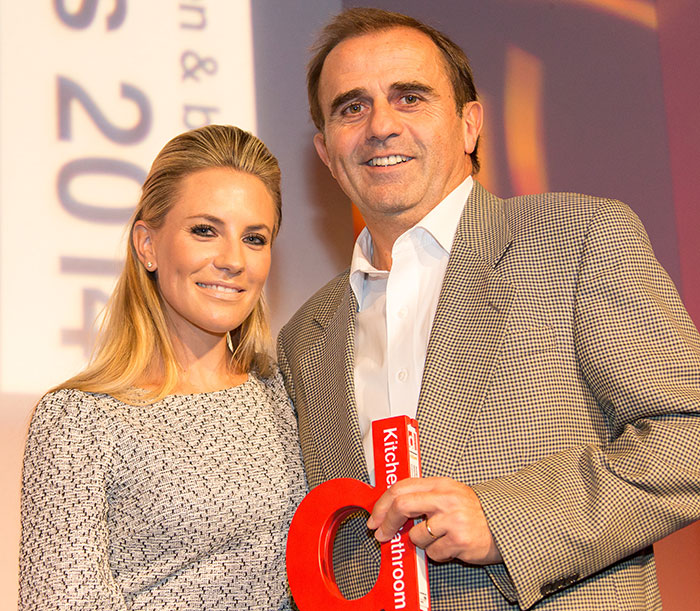 Christophe Gontier, Managing Director for Cosentino UK & IE collecting the award from Georgie Thomspon, TV Presente