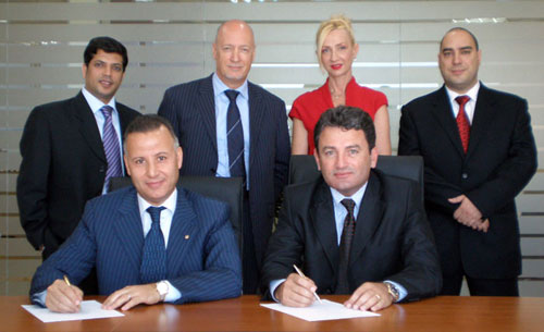 Front: Bassam Al Awar, GM, Tour & Andersson, Middle East, Africa & India - Raphael Khlat, MD,<br>Faisal Jassim Trading Co., Back: Ajay Puri - Colin Bridges - Nadia Jones - Saeed Abul Husn.