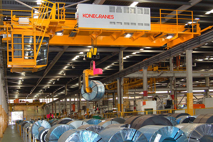 A 20-ton SMARTON crane operating in the coil storage area of a steel mill. © Konecranes