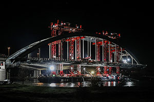 Mammoet Moves Steel-Arched Bridge in Nighttime Operation