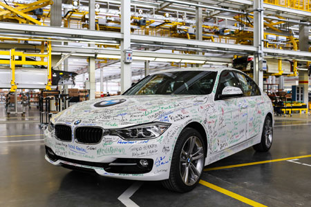 Autographed BMW rolls of the line of new plant.